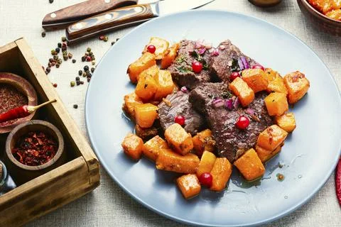 Roasted beef with pumpkin Stock Photos