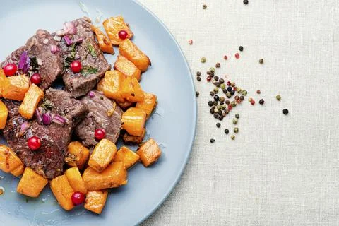 Roasted beef with pumpkin Stock Photos
