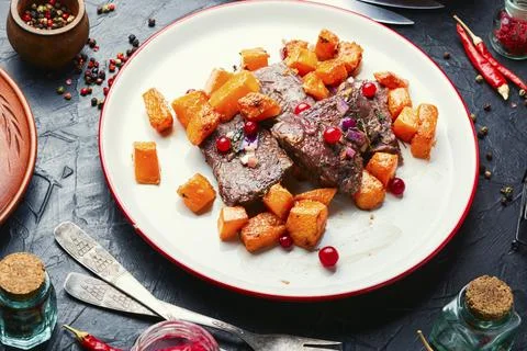 Roasted beef with pumpkin Stock Photos