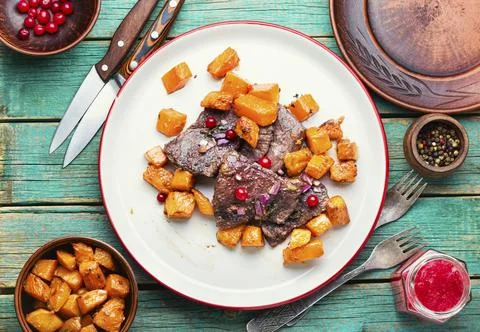 Roasted beef with pumpkin Stock Photos