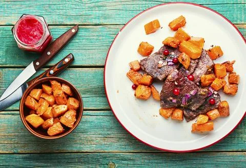 Roasted beef with pumpkin Stock Photos
