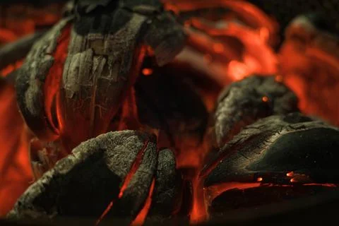 Roasted Bread fruit  under coconut skin, blazing fire, Seychelles autantiqu Stock Photos