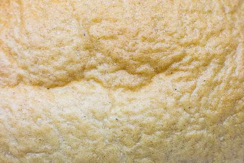 Roasted Bread texture background. Loaf Bakery concept. Close up, macro phot.. Stock Photos