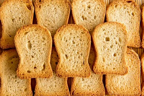 Roasted bread texture background. Stock Photos