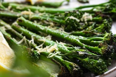 Roasted broccolini on the plate. Stock Photos