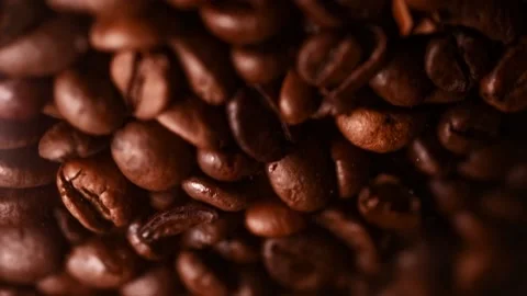 Roasted brown coffee beans background. Close up of seeds of coffee Stock-Footage 151118785
