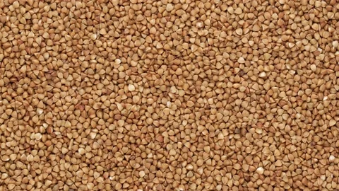 Roasted buckwheat, top view. Buckwheat, dolly shot. Stock Footage 141364593