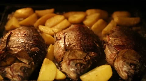 Roasted carp with potatoes in the oven 動画素材 68193877