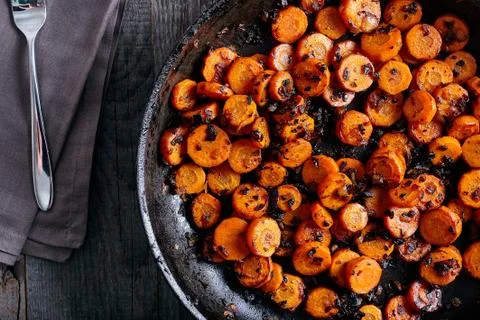 Roasted carrots on the pan Stock Photos