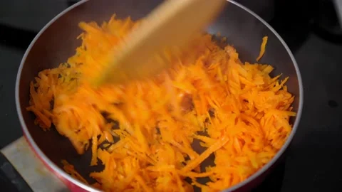 Roasted carrots, recipe for root vegetables, selected focus, close up Stock Footage 223557839
