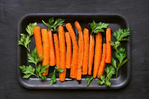 Roasted carrots, top view Stock Photos