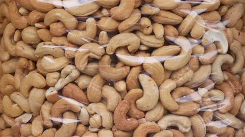 Roasted Cashew Nuts In A Large Plastic Bag Stock Footage 167607433