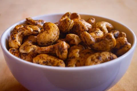 Roasted cashew nuts with salt and black pepper mix. Stock Photos