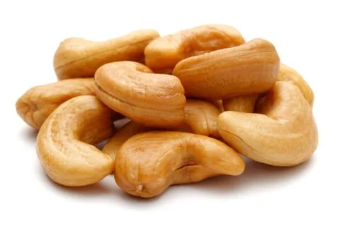 Roasted cashew nuts on white background Stock Photos