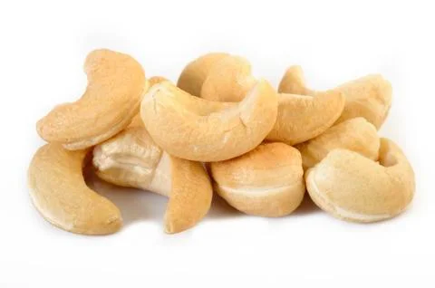 Roasted cashew nuts on white Stock Photos