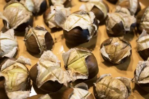 Roasted Chestnuts on Baking Sheet Stock Photos