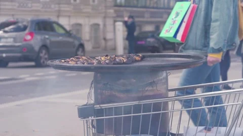 Roasted Chestnuts Cooking On Improvised Vendor Stove In Shopping Cart With Stock Footage 340180856