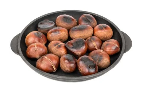 Roasted chestnuts in pan Stock Photos