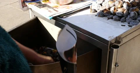 Roasted chestnuts sold at streets of Porto, Portugal Stock Footage 59123104