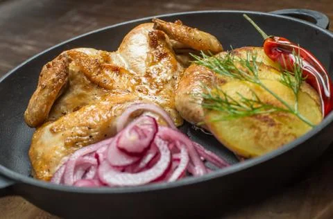 Roasted chicken and vegetables Stock Photos