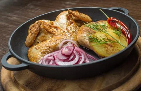 Roasted chicken and vegetables Stock Photos