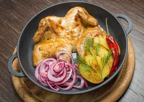 Roasted chicken and vegetables Stock Photos