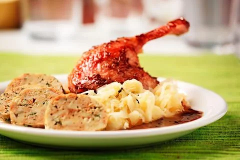 Roasted chicken drumstick with mashed potatoes Stock Photos