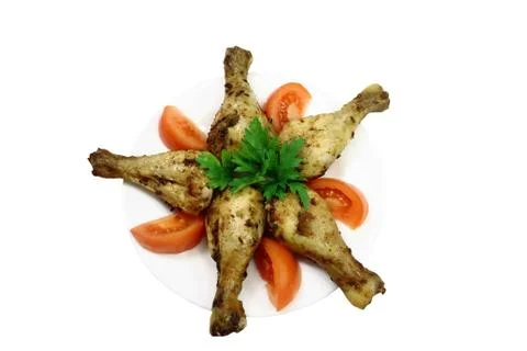 Roasted chicken drumsticks Stock Photos