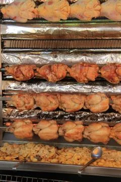 Roasted chicken on the grill Stock Photos