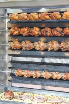 Roasted chicken on the grill Stock Photos