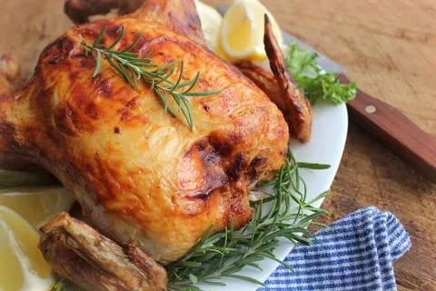 Roasted chicken with herbs Stock Photos