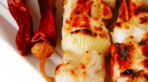 Roasted chicken kebab on white Vídeos de archivo 45137091