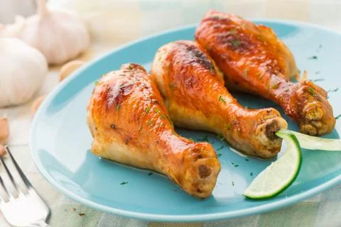 Roasted chicken legs Stock Photos