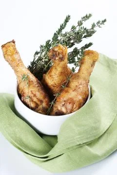 Roasted chicken legs with thyme Foto stock