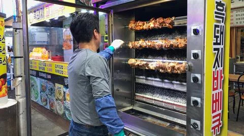 Roasted chicken man Stock Photos