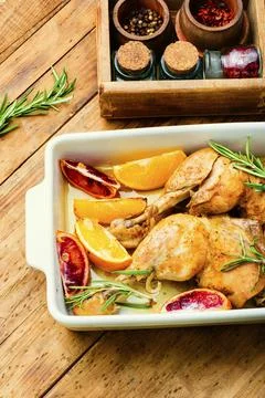 Roasted chicken with oranges Stock Photos