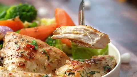 Roasted Chicken piece taking with chopped spoon , Real time Close-up view Video stock 286072341