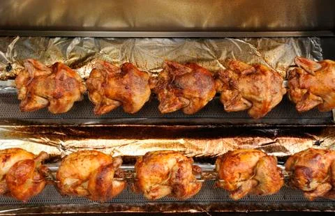 Roasted the chicken on the spit Stock Photos