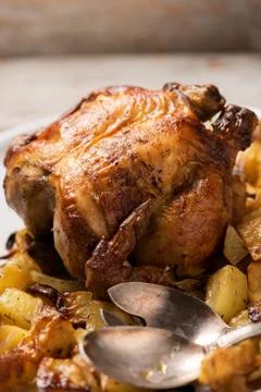 Roasted chicken with vegetables on a plate Stock Photos