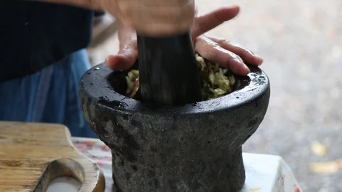 Roasted chili paste with mortar in Thai kitchen. Video stock 97005326