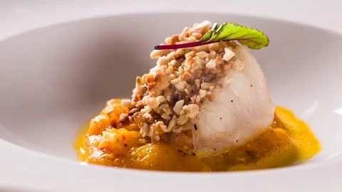 Roasted cod, codfish with baked pumpkin. Front view with smoke Video stock 142238773