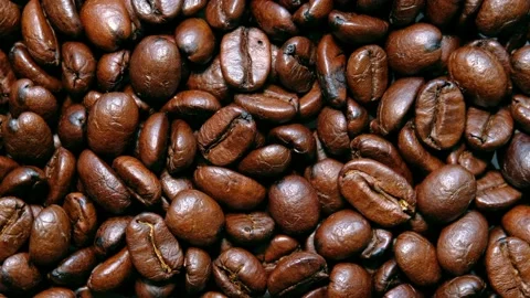 Roasted coffee bean. Fragrant coffee beans scrolls slowly around the camera.Top  Stock Footage 139183106