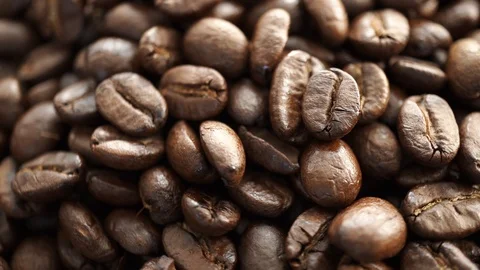 Roasted coffee bean rotating clockwise, selective focus 库存影片 121108980