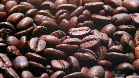 Roasted coffee bean.Fragrant coffee beans rotating around the camera, coffee bea Stock Footage 139180886