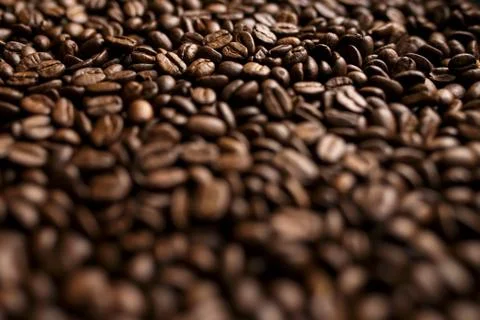 Roasted coffee beans background. Abstract texture pattern Stock Photos