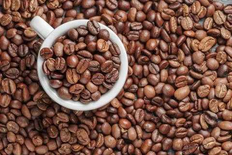 Roasted coffee beans as background close up Stockfoto's