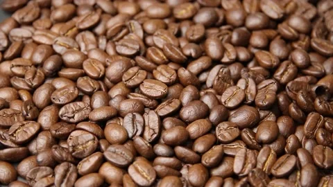 Roasted coffee beans background. Coffee bean Video stock 197050018