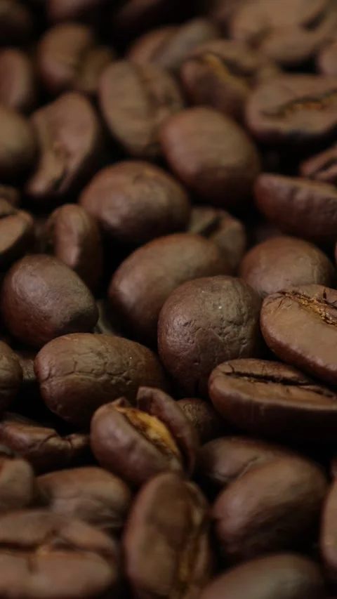 Roasted coffee beans background Video stock 276451891