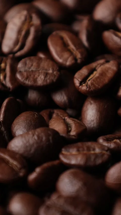 Roasted coffee beans background Stock Footage 276451899