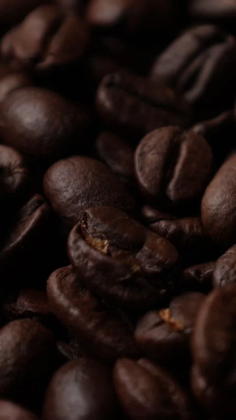 Roasted coffee beans background Video stock 276451904